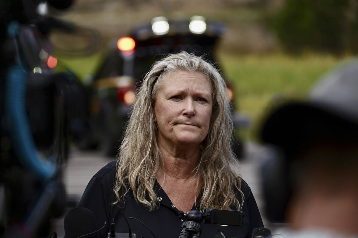 Jefferson County, Colo., Sheriffs Department spokesperson Jacki Kelley waits to speak with memb ...