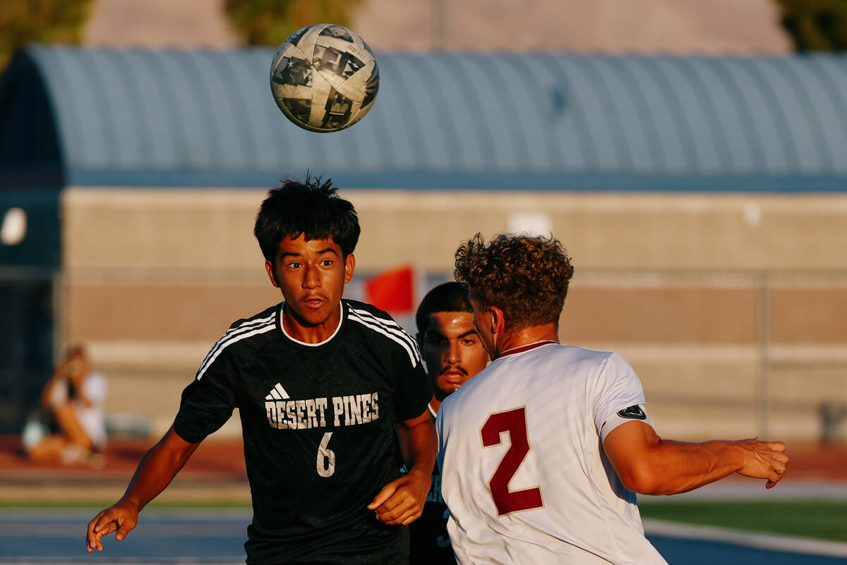 Desert Pines midfielder Eric Briones (6) heads the ball during the soccer game against Faith Lu ...
