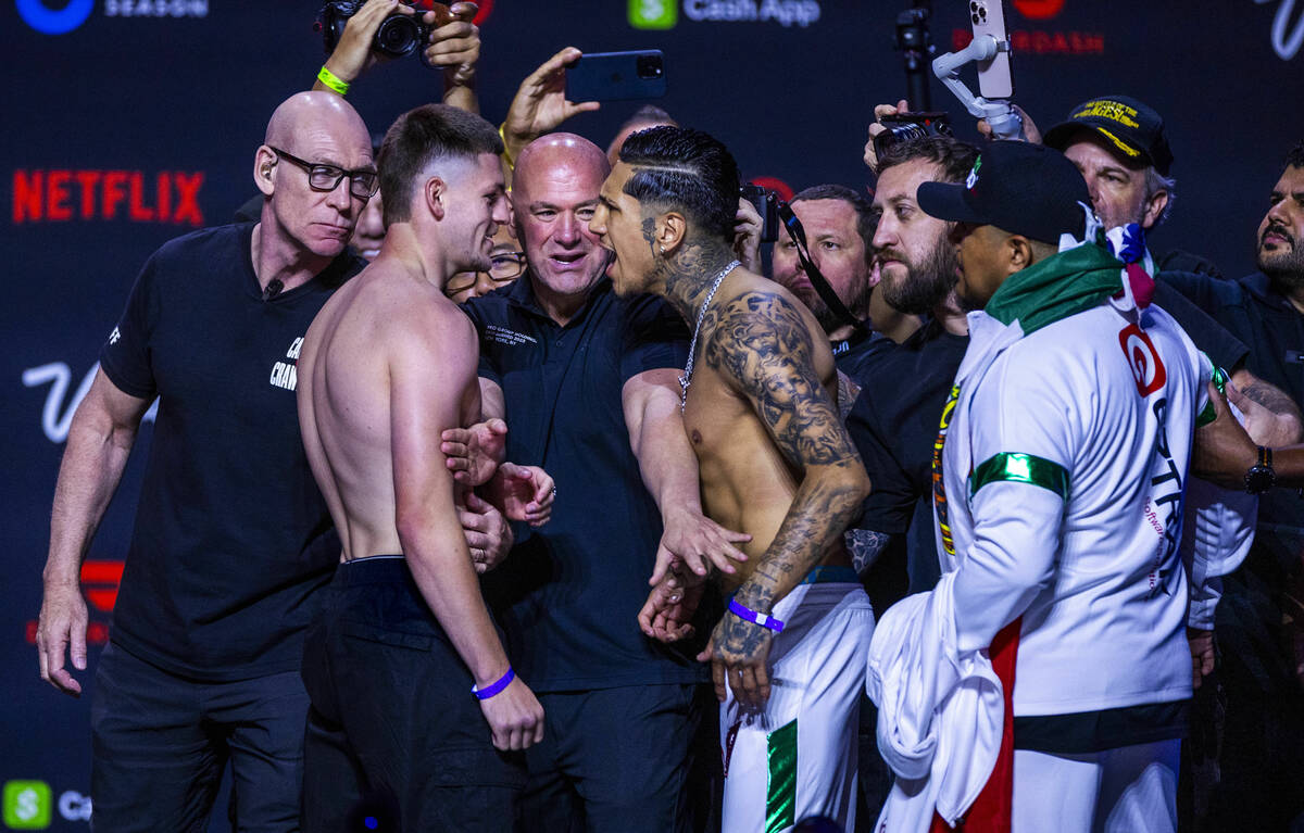 Middleweight fighters Callum Walsh and Fernando Vargas Jr. exchange words as they face off foll ...
