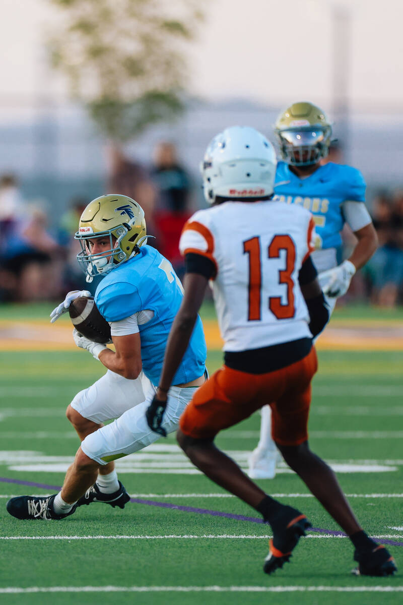 Foothill wide receiver Nixon Gasperosky (2) carries the ball during a football game between Foo ...