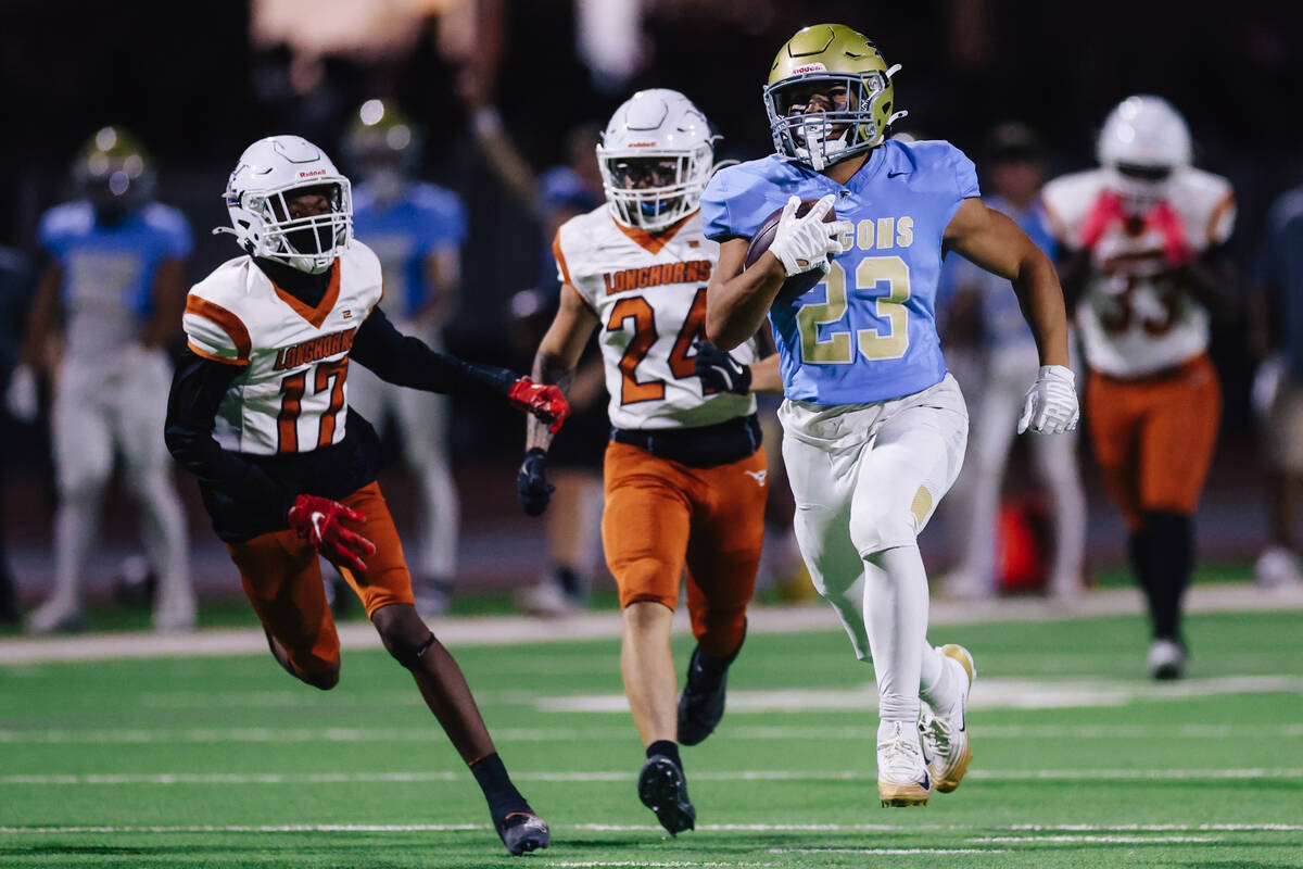 Foothill running back Anthony Taylor (23) runs the ball for a touchdown during a football game ...