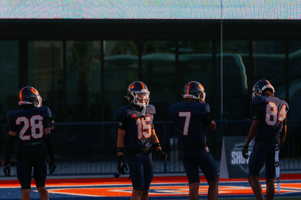 Bishop Gorman players warm up before the football game against East St. Louis on Friday, Sept. ...