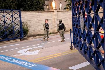 U.S. Navy Security Forces stand on duty at the U.S. Naval Academy in Annapolis, Md., Thursday, ...