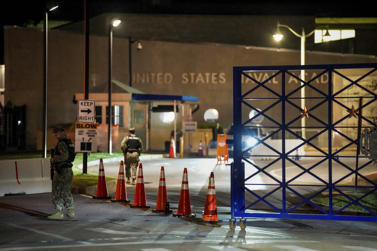Response vehicles leave through the main gate of the Naval Academy, Thursday, Sept. 11, 2025, i ...