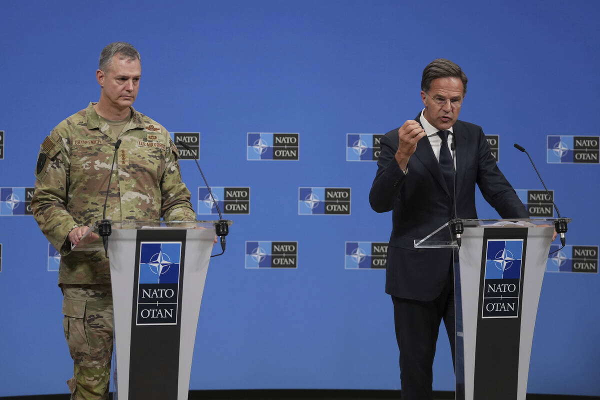 NATO Secretary General Mark Rutte, right, and Supreme Allied Commander Europe (SACEUR), General ...