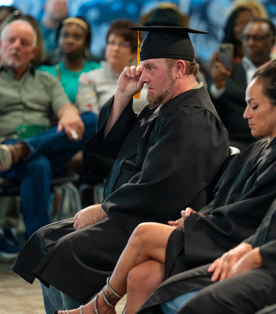 Kalub Jensen becomes emotional during a graduation ceremony at the Metropolitan Police Departme ...