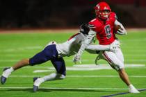 Arbor View wide receiver Kai Cypher (9) runs the ball as Coronado free safety Jackson Humphrie ...