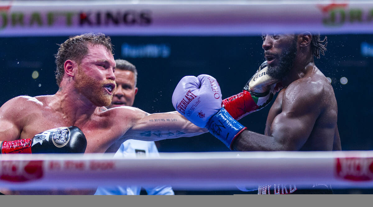 Canelo Alvarez connects to the face of Terence Crawford during their undisputed super middlewei ...