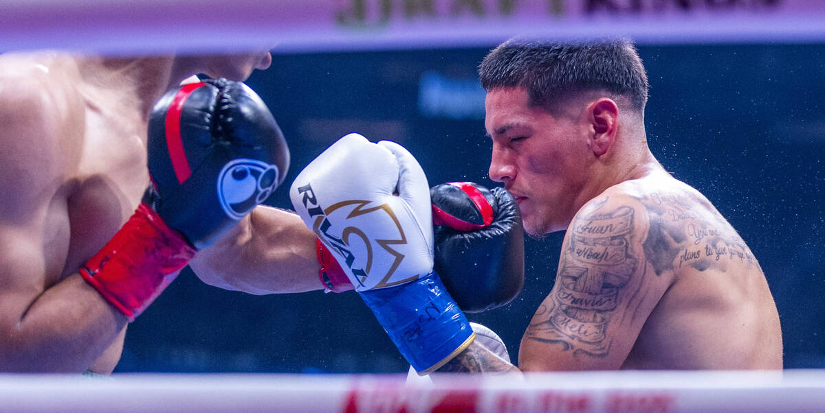 Mohammed Alakel connects with the chin of John Ornelas during their lightweight fight at Allegi ...