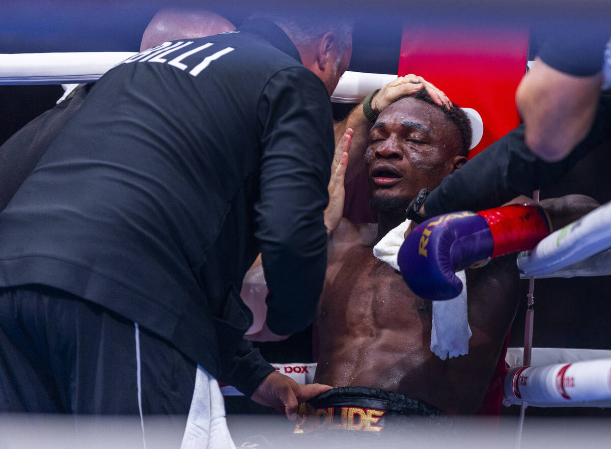 Christian Mbilli is wiped out in his corner against Lester Martinez during their super middlewe ...