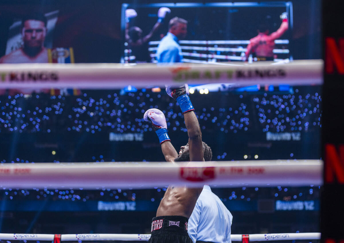 Terence Crawford celebrates his win over Canelo Alvarez during their undisputed super middlewei ...