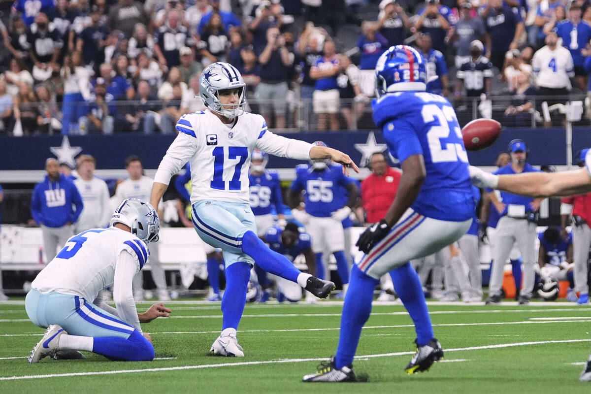 Dallas Cowboys place kicker Brandon Aubrey (17) kicks a game-winning field goal as New York Gia ...
