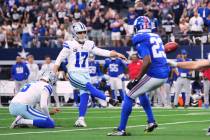 Dallas Cowboys place kicker Brandon Aubrey (17) kicks a game-winning field goal as New York Gia ...