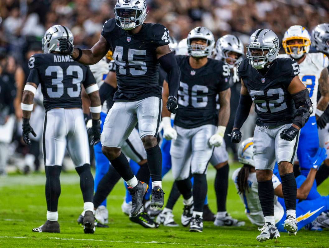 Raiders linebacker Devin White (45) celebrates a big stop against Los Angeles Chargers quarterb ...