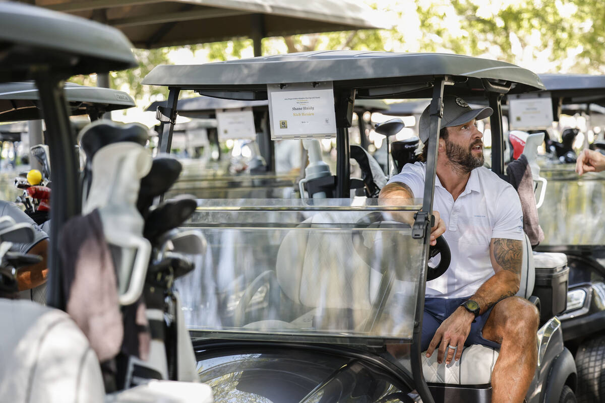 Former Golden Knights defenseman Deryk Engelland speaks with fans before the start of the Golde ...