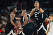 Aces center A'ja Wilson (22) celebrates during game one of a first round WNBA playoff game betw ...