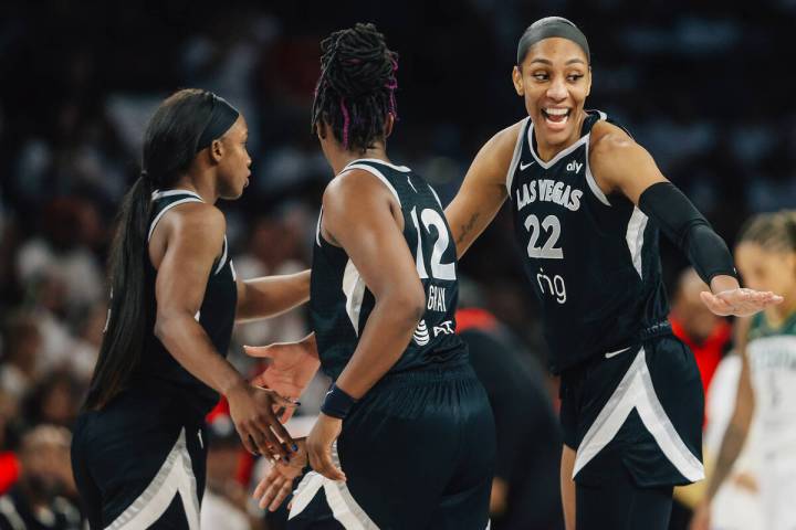 Aces center A'ja Wilson (22) celebrates during game one of a first round WNBA playoff game betw ...