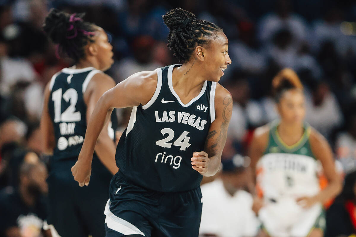 Aces guard Jewell Loyd smiles during game one of a first round WNBA playoff game between the Ac ...