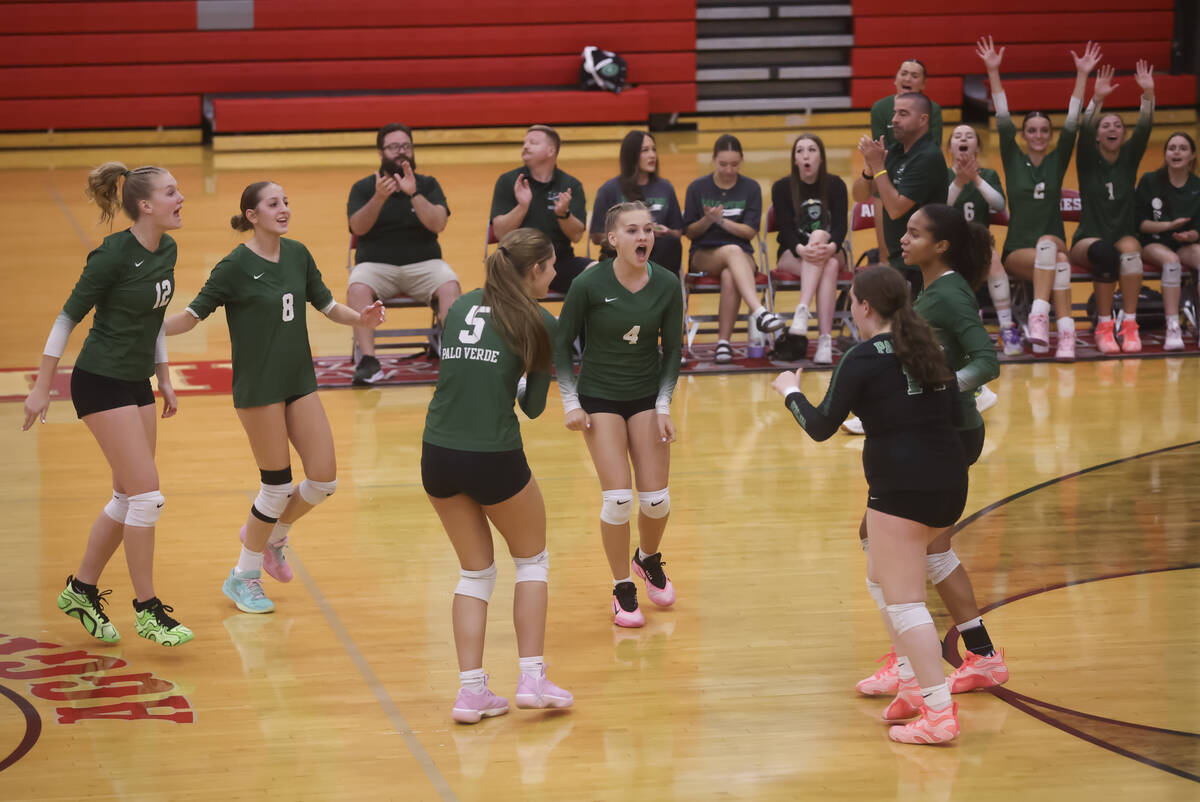 Palo Verde players celebrate after a play during a volleyball game at Arbor View High School on ...