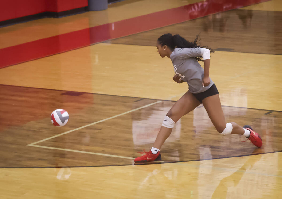 Arbor View's Audrey Jaeck (1) watches as the ball lands just inside the line during a voll ...