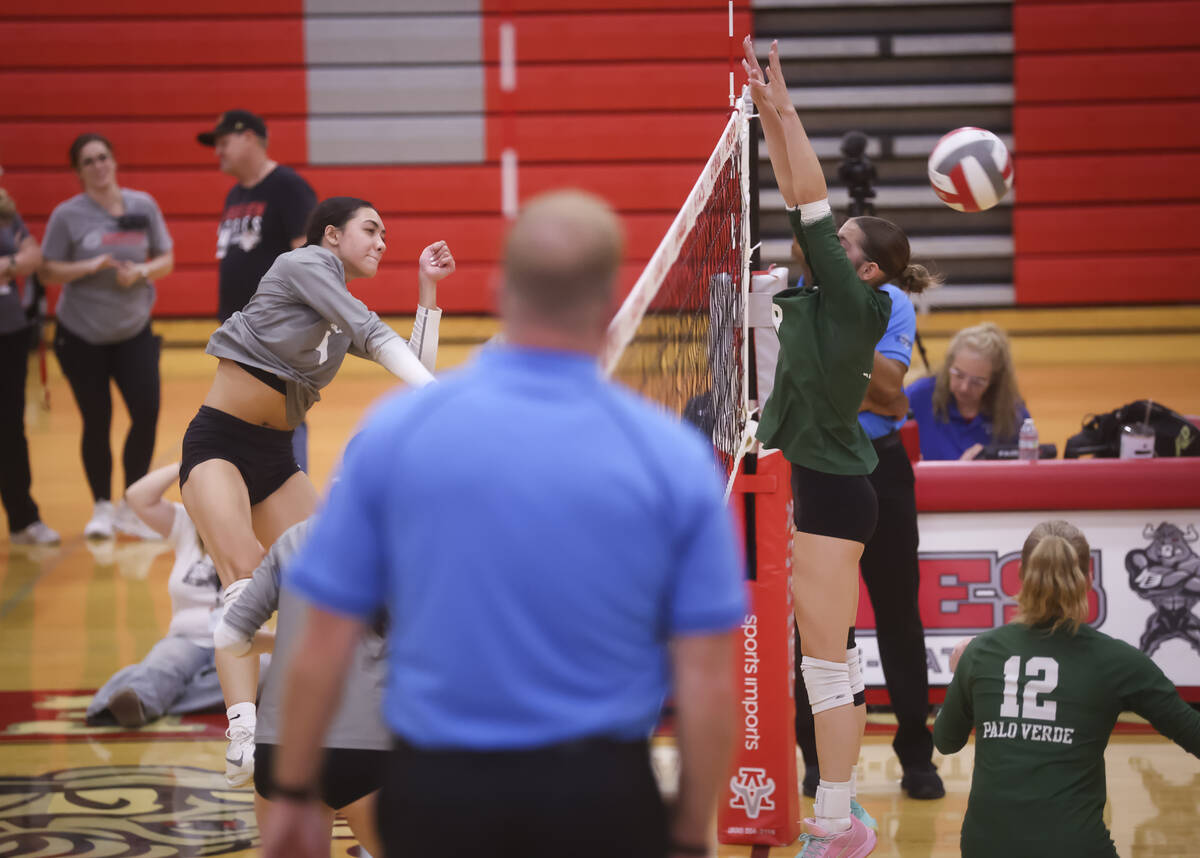 Arbor View outside hitter Tamara Vai Unga (9) spikes the ball past Palo Verde during a volleyba ...
