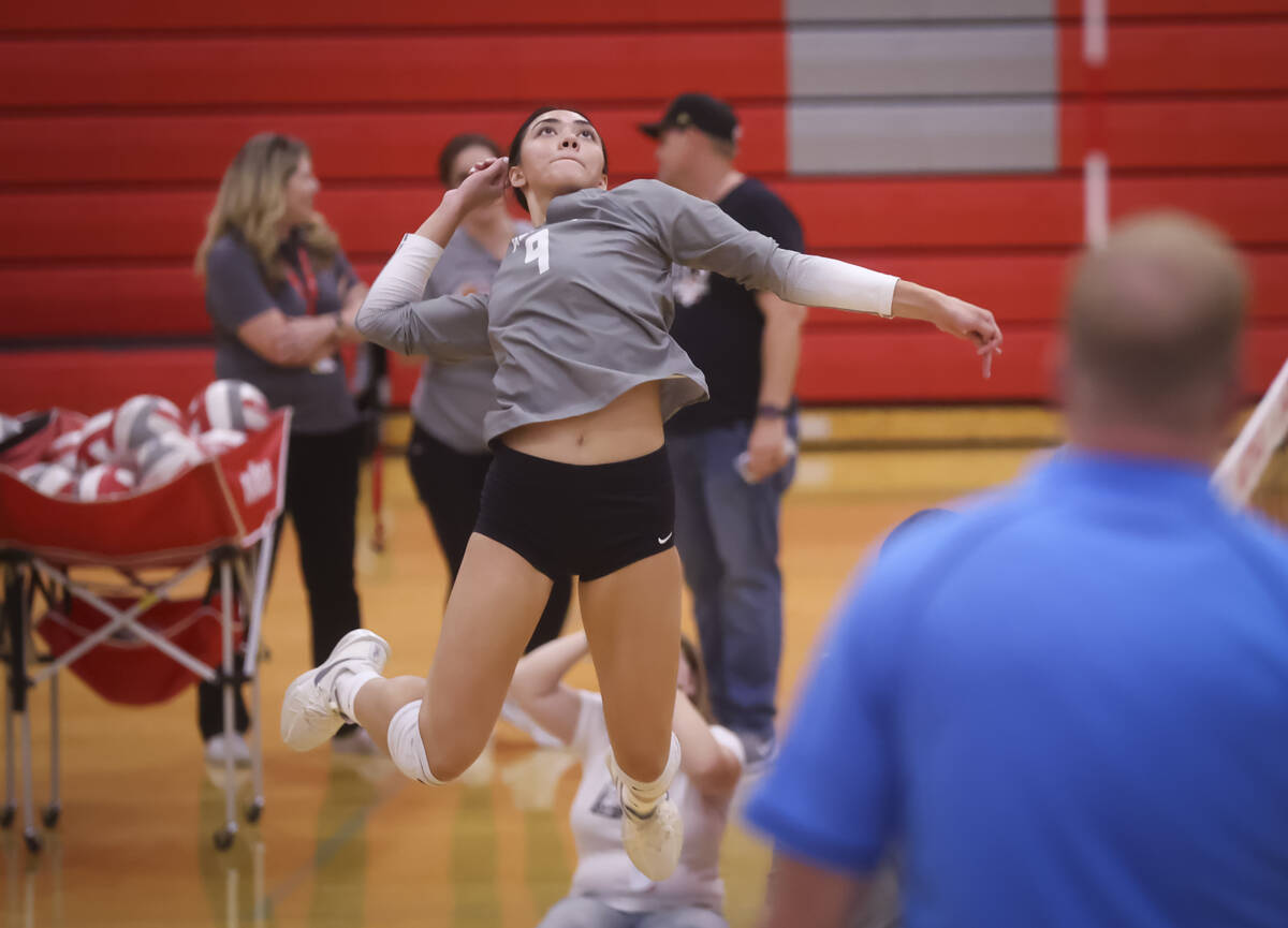 Arbor View outside hitter Tamara Vai Unga (9) lines up the ball before spiking against Palo Ver ...