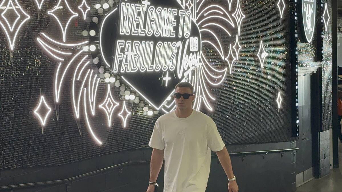 Raiders wide receiver Jack Bech walks through the "Fabulous Tunnel Walk" on Monday, Sept. 15, 2 ...