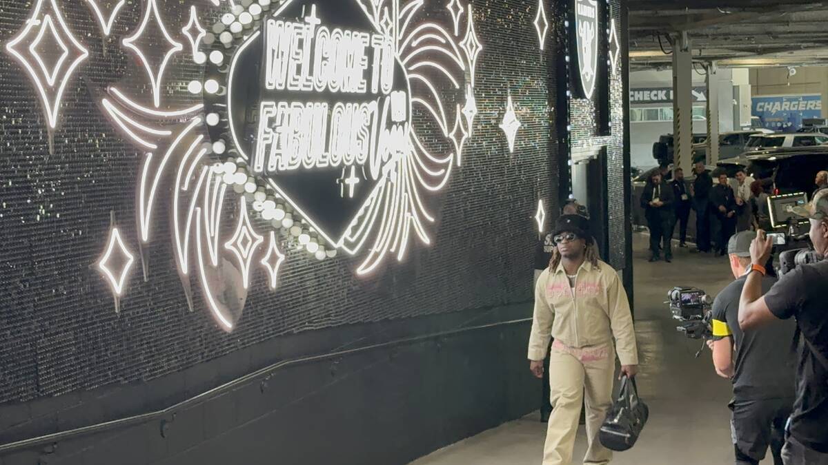 Raiders runningback Ashton Jeanty walks through the "Fabulous Tunnel Walk" on Monday, Sept. 15, ...