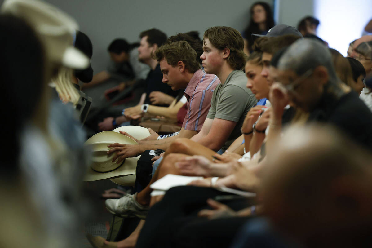 Attendees listen to a speaker during a vigil for Charlie Kirk hosted by Turning Point at the UN ...