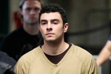 Luigi Mangione is escorted into Manhattan state court in New York, Tuesday, Sept. 16, 2025. (AP ...