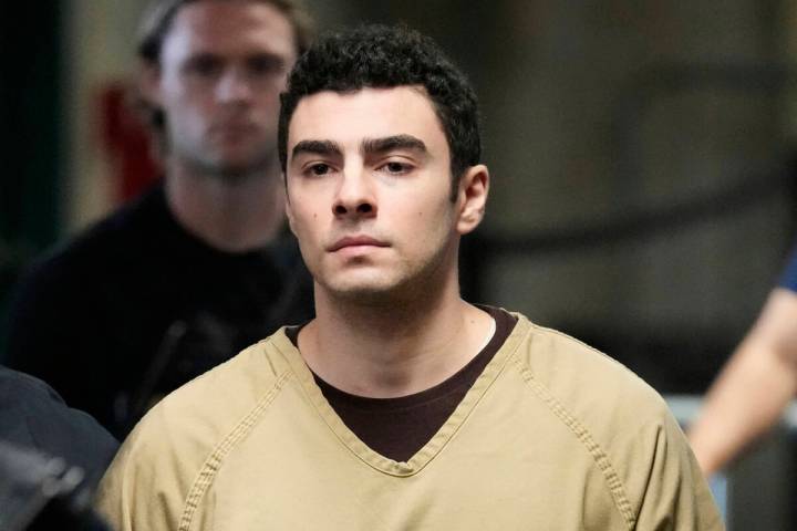 Luigi Mangione is escorted into Manhattan state court in New York, Tuesday, Sept. 16, 2025. (AP ...