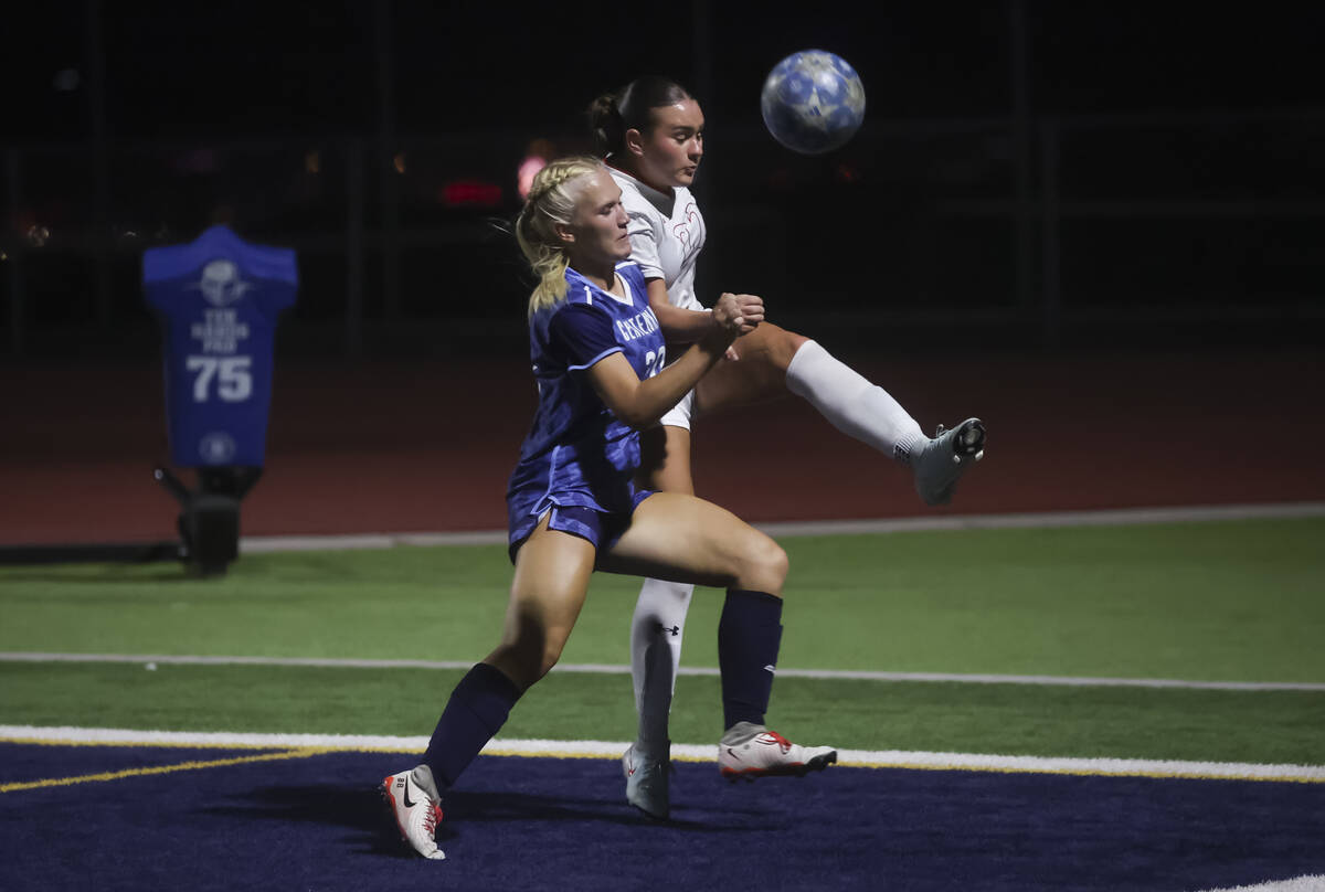 Arbor View's Sydney Smith (22) kicks the ball out of bounds against Centennial's Skyl ...