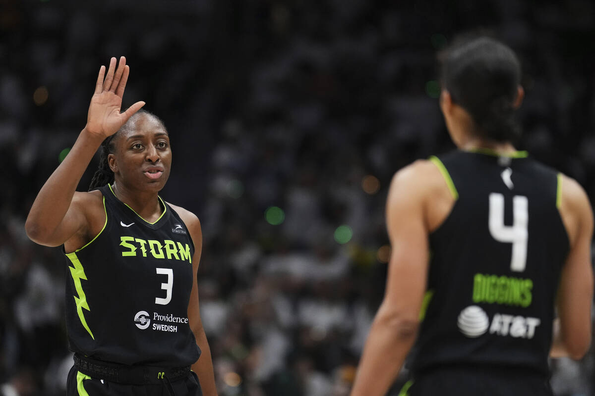 Seattle Storm forward Nneka Ogwumike greets guard Skylar Diggins (4) during the first half of G ...
