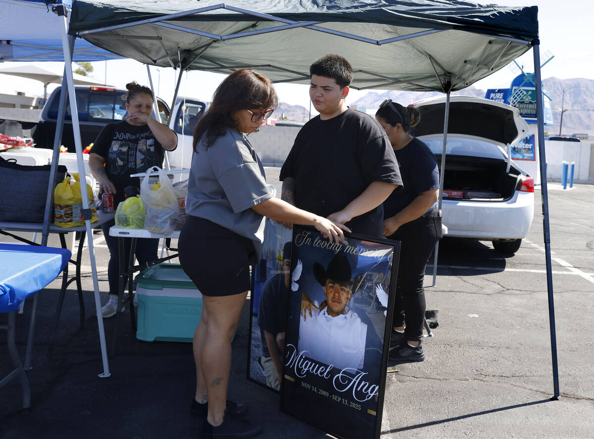 Evelyn Delgardo, right, the sister of Miguel Aparicio-Gaspar, a teenager from North Las Vegas w ...
