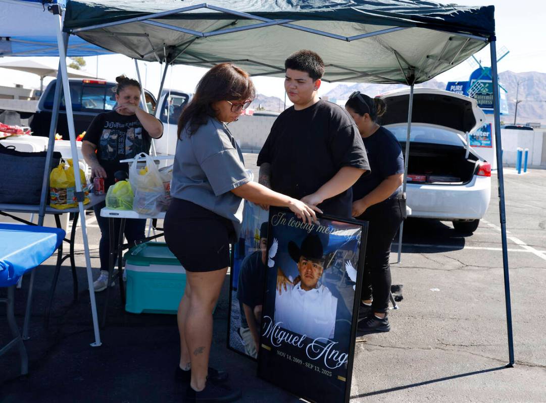 Evelyn Delgardo, right, the sister of Miguel Aparicio-Gaspar, a teenager from North Las Vegas w ...