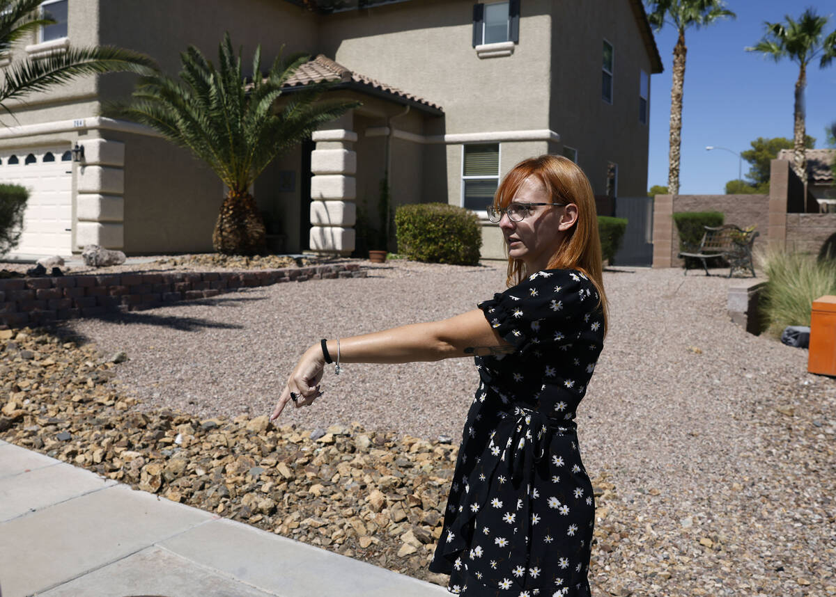 Rebecca Bobowski, whose dog, Bruno, was shot by a Henderson police officer on Sept. 5, points w ...