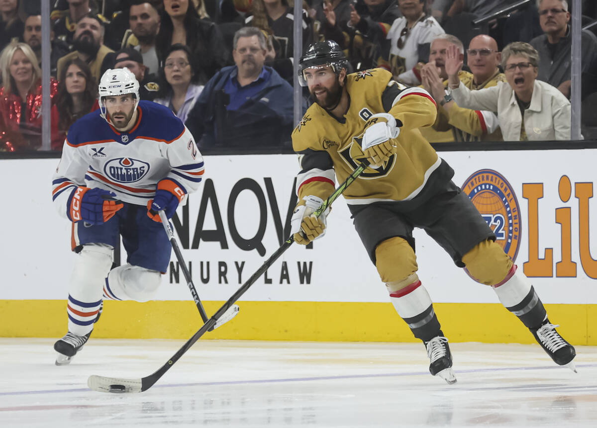 Golden Knights defenseman Alex Pietrangelo (7) passes the puck in front of Edmonton Oilers defe ...