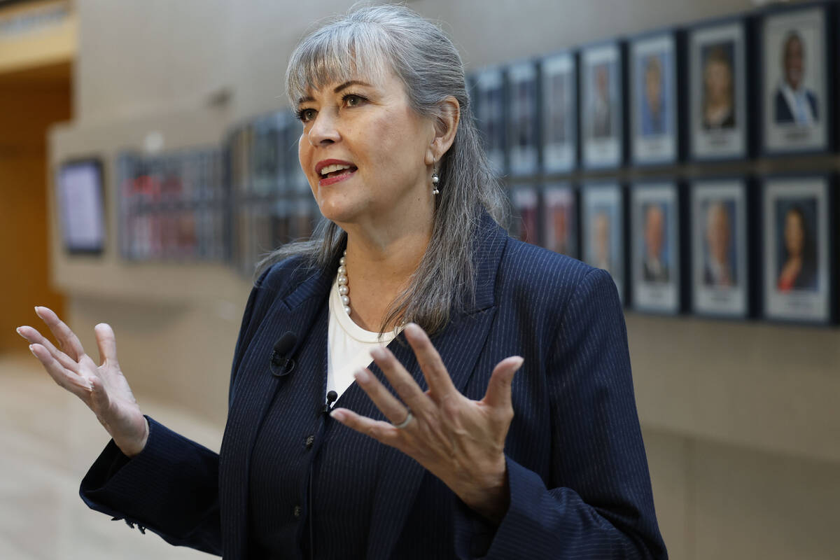 Newly chosen interim Ward 2 councilwoman Kara Kelley speaks to the media at Las Vegas City Hall ...
