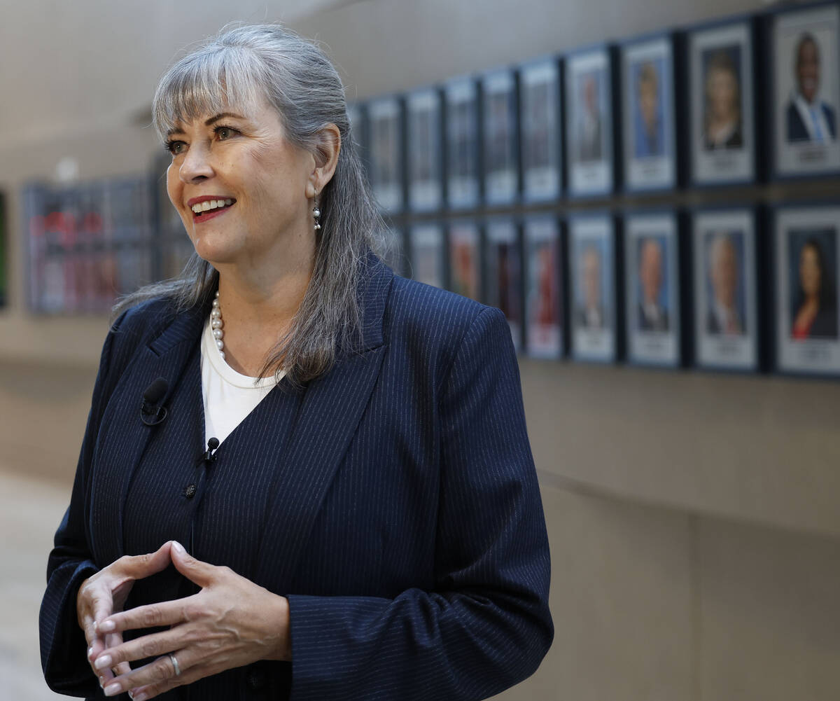 Newly chosen interim Ward 2 councilwoman Kara Kelley speaks to the media at Las Vegas City Hall ...