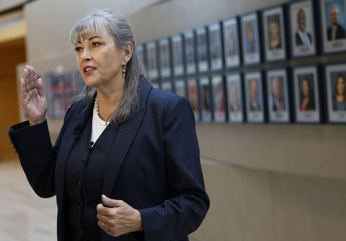 Newly chosen interim councilwoman Kara Kelley speaks to the media at Las Vegas City Hall Wednes ...