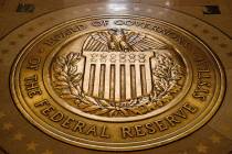 FILE- In this Feb. 5, 2018, file photo, the seal of the Board of Governors of the United States ...