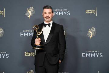 Jimmy Kimmel poses in the press room with the award for host for a game show for "Who Want ...