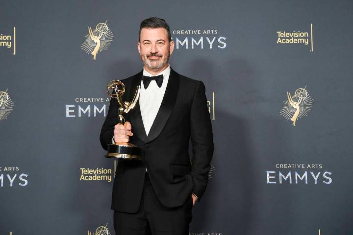 Jimmy Kimmel poses in the press room with the award for host for a game show for "Who Wants to ...