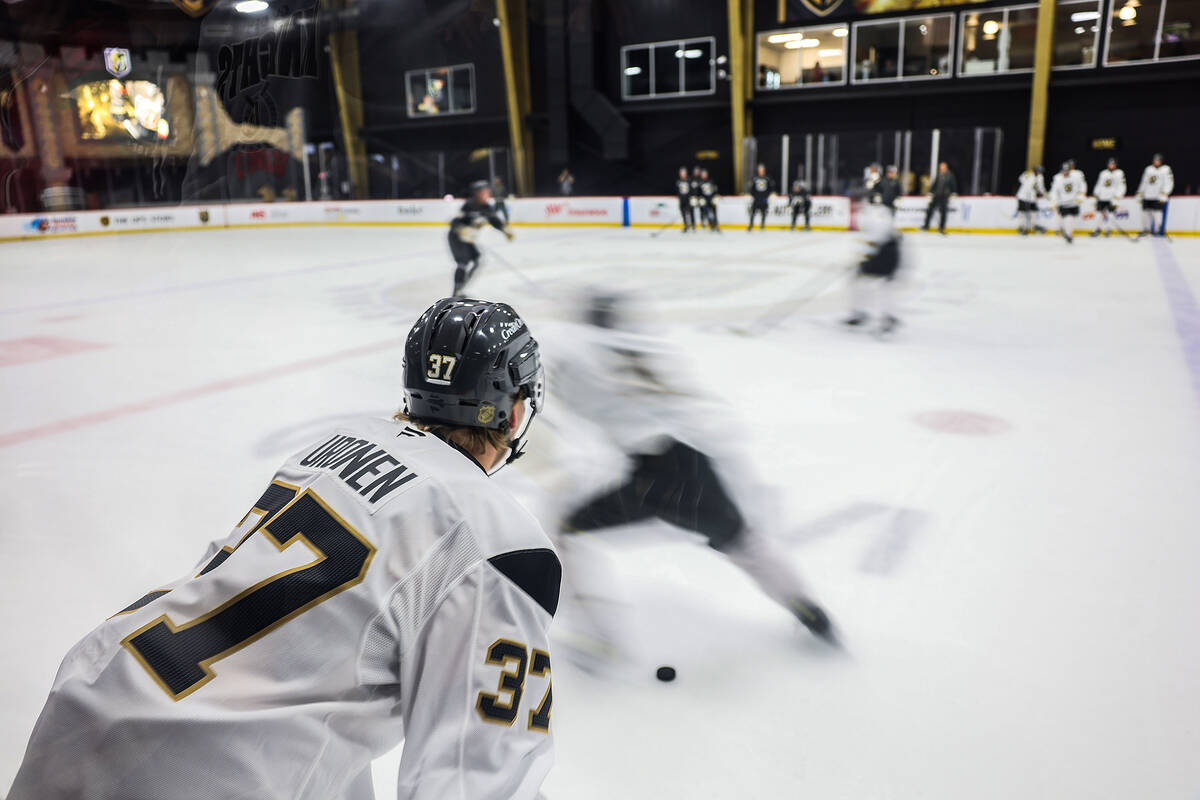 Golden Knights players run through drills during the first day of training camp Thursday, Sept. ...