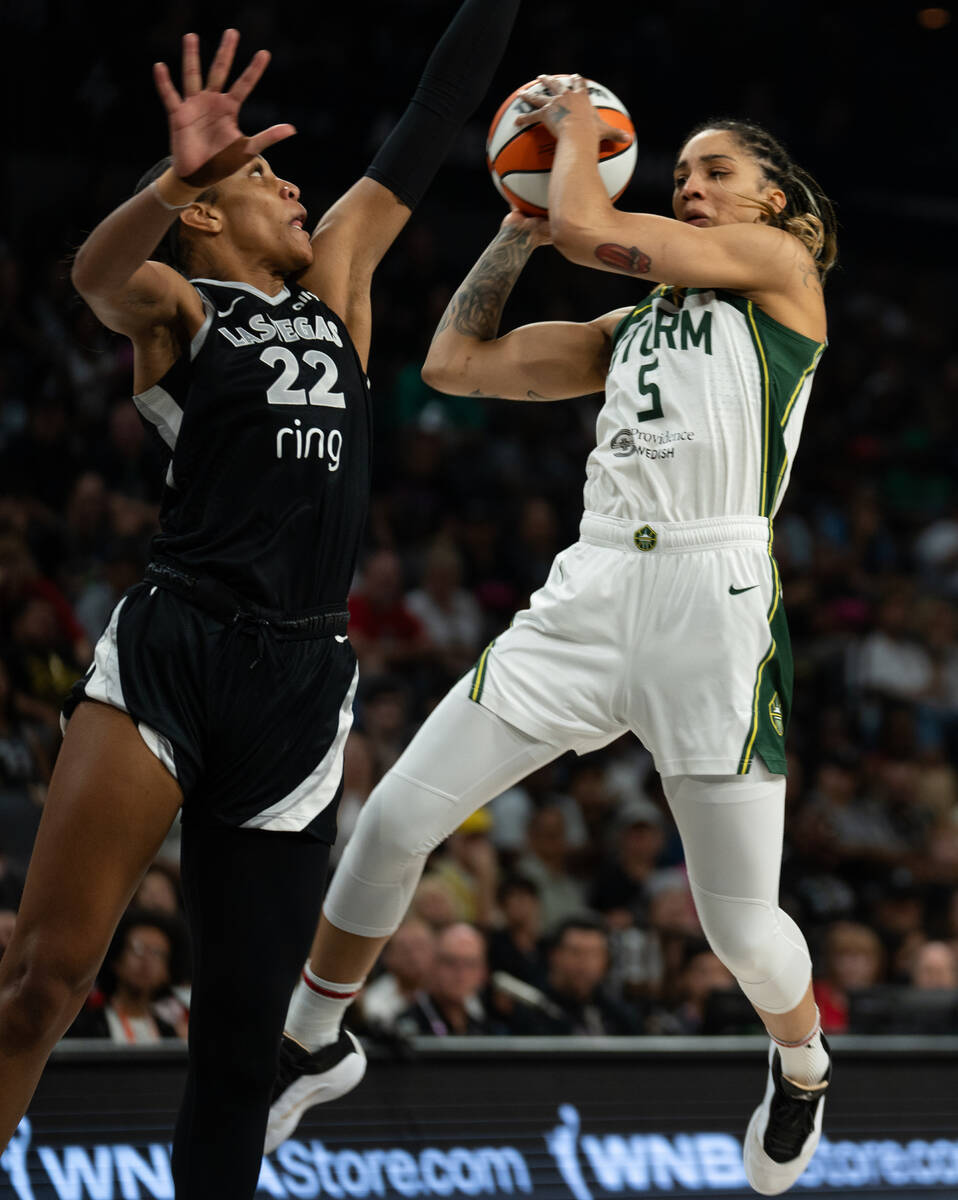 Seattle Storm forward Gabby Williams (5) jumps to take a shot over Las Vegas Aces center A&#039 ...