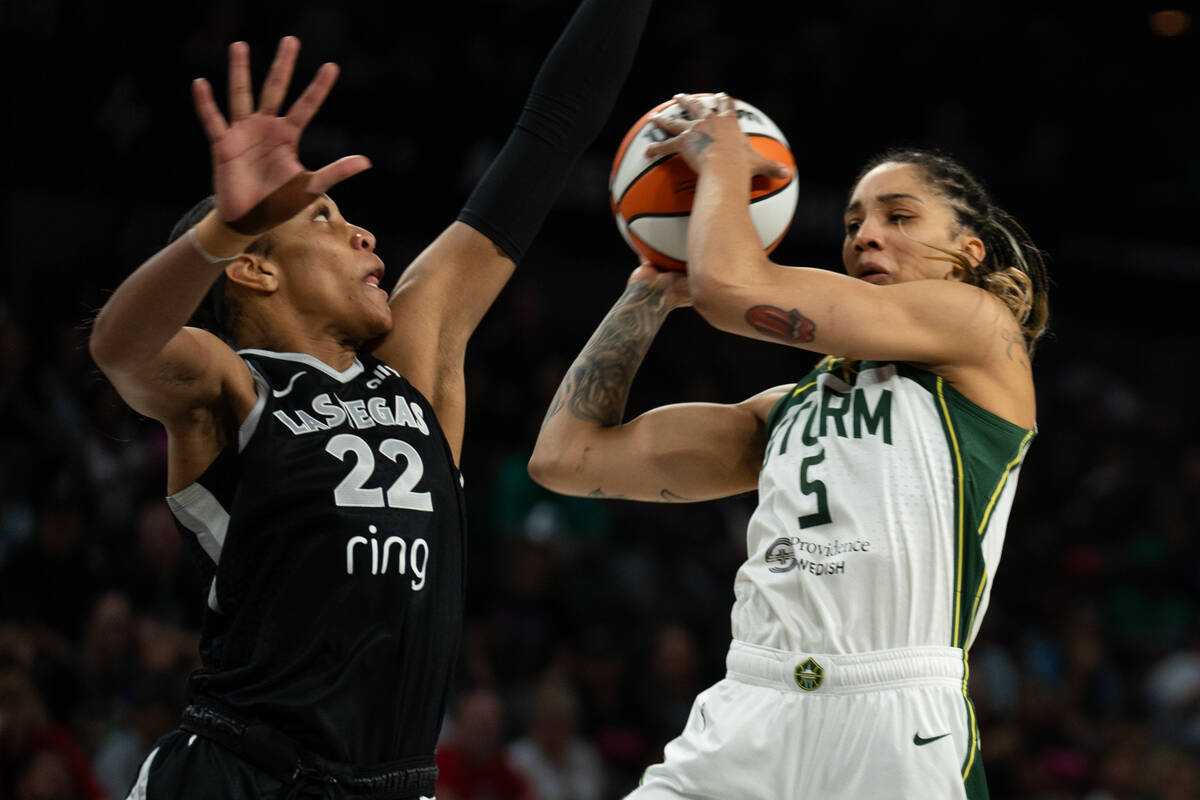 Seattle Storm forward Gabby Williams (5) jumps to take a shot over Las Vegas Aces center A&#039 ...