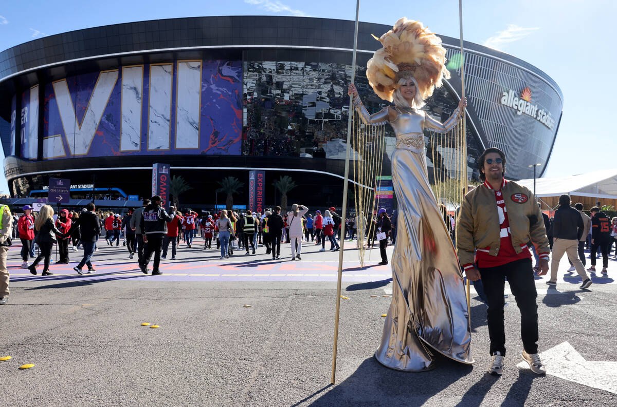 49ers and Chiefs fans arrive at Allegiant Stadium in Las Vegas before their teams complete in t ...
