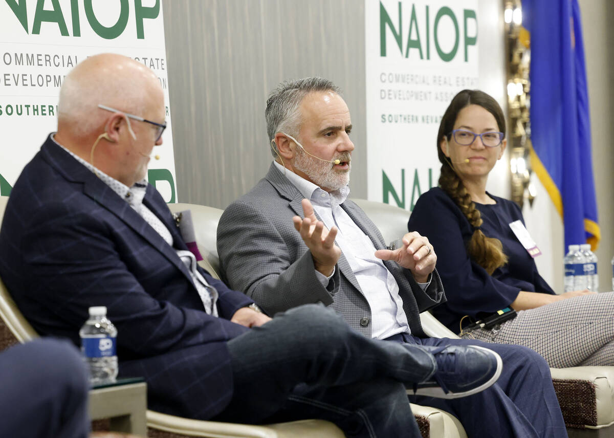 Jeff Brigger, center, director of business development and major accounts at NV Energy, speaks ...