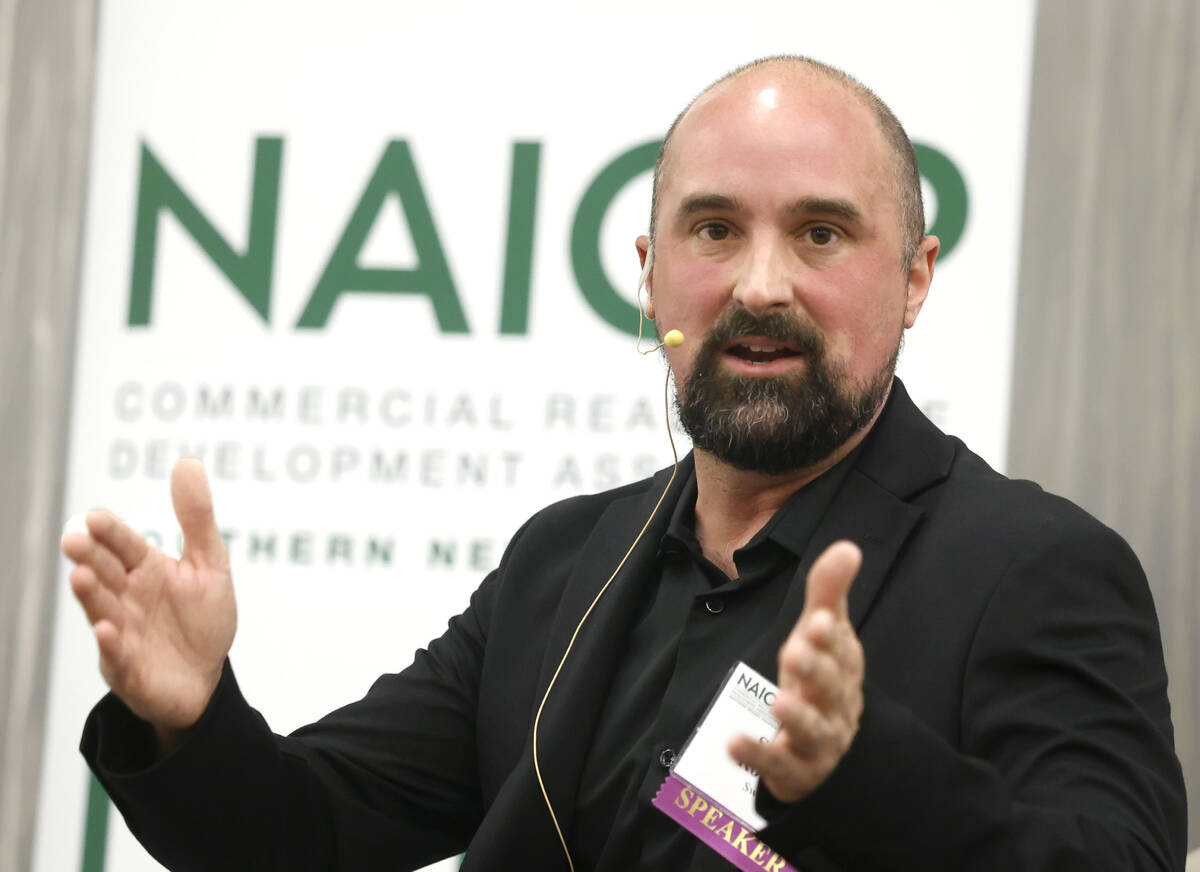 Steven Roberts, vice president of construction development for Switch, speaks during the NAIOP ...