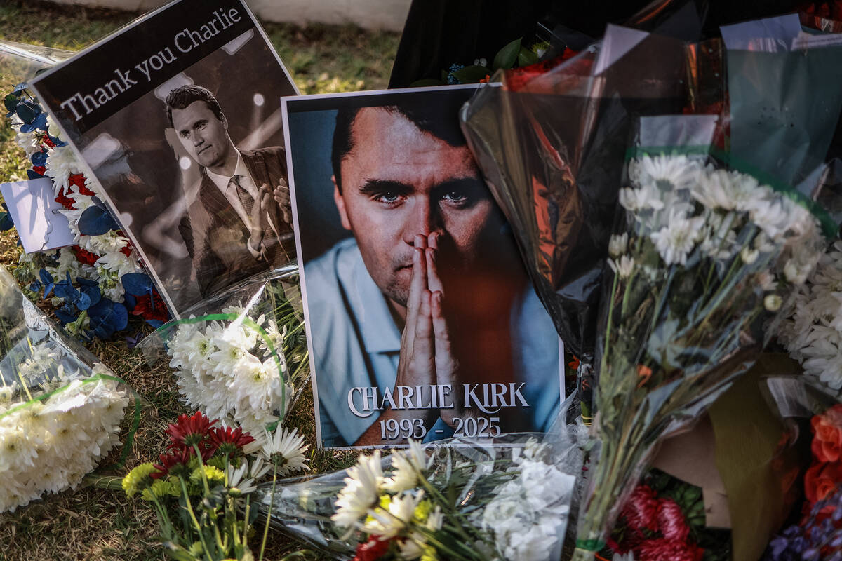 A general view of a wreath laid by mourners outside the US Embassy in Pretoria on Sept. 11, 202 ...